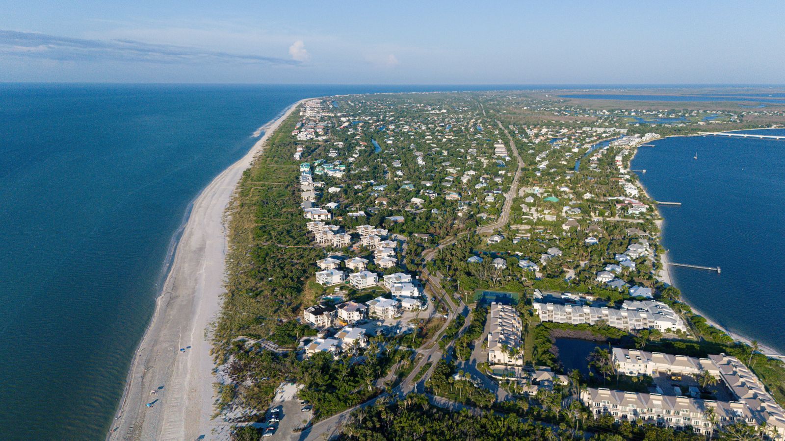 Aerial view of Sanibel Island's Gulf beach, homes and mangroves, the setting for most things to do on Sanibel Island